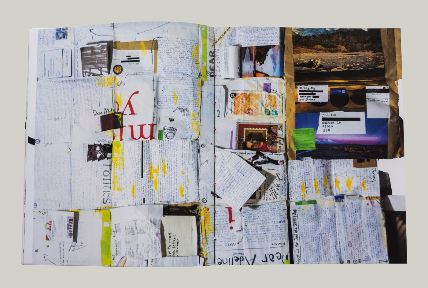 An interior spread showcasing the ninth letter of The 10 Letters Project. Countless pieces of paper nad hand written notes are collaged like a quilt across the entire spread.