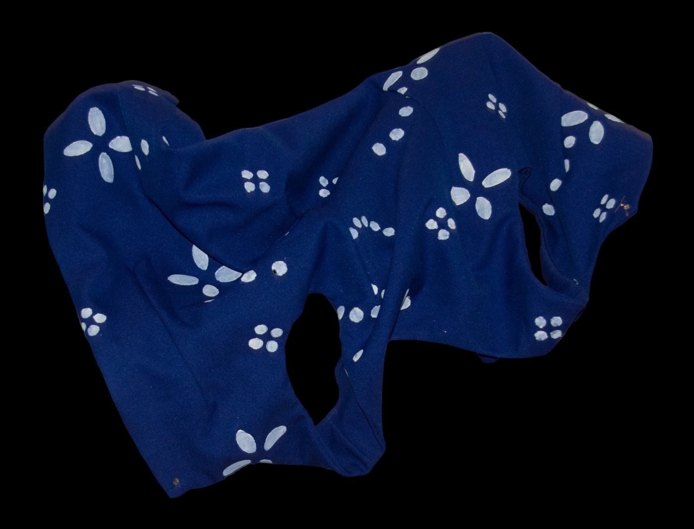 an image of a blue garment with various white painted patterns on it