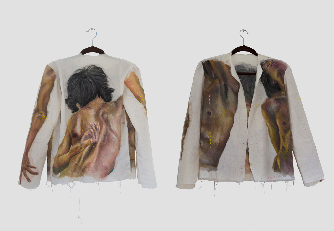 a front and back view of a jacket hung on a clothes hanger. On both sides, images of a nude person is painted on it.