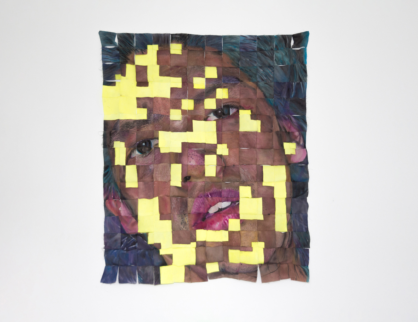 a self-portrait of the artist painted on 180 squares stitched together. various squares of bright yellow mask the face