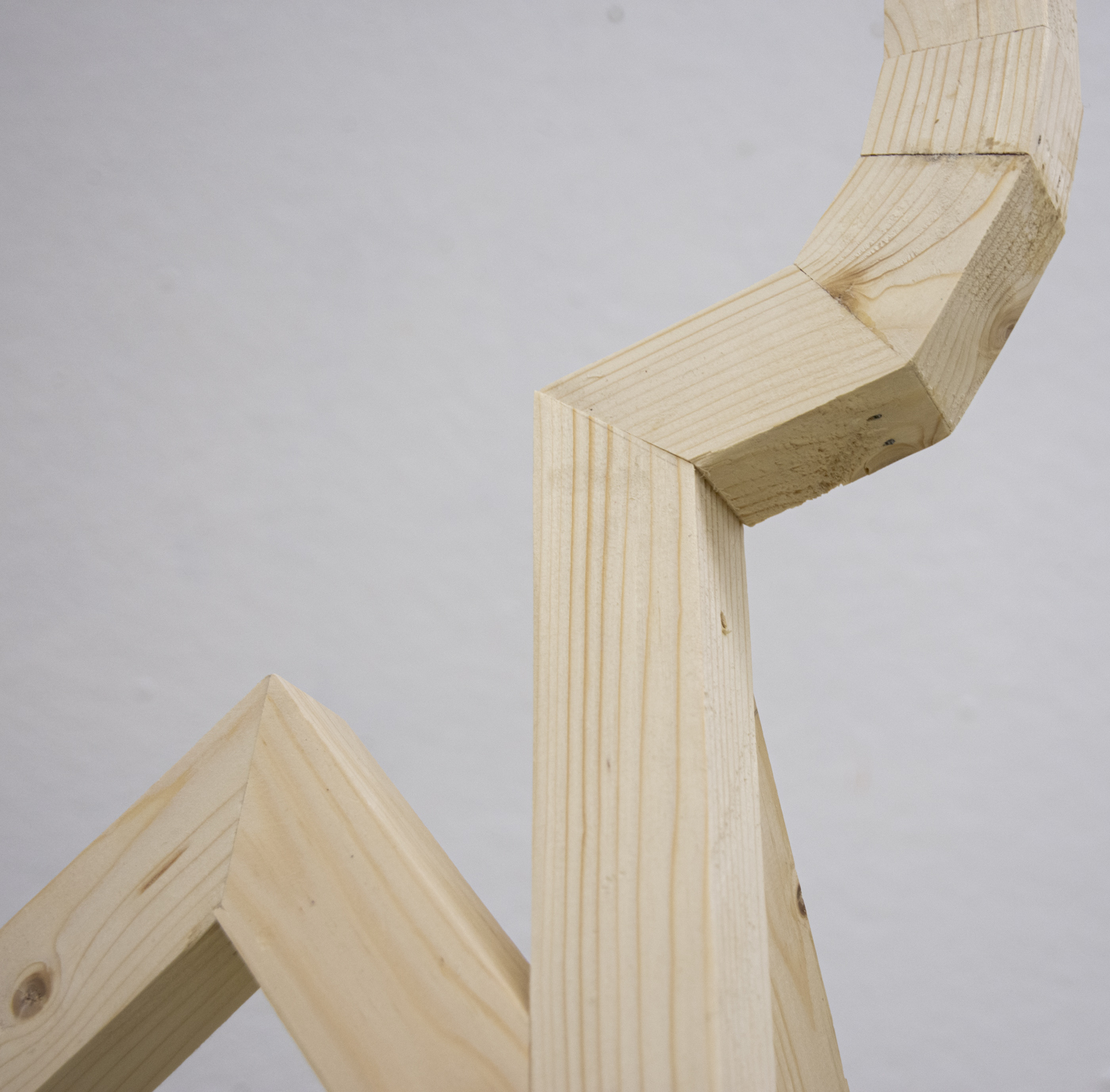 a close-up image of wooden pieces joined together.